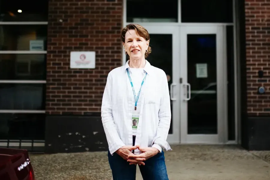 UGM Volunteer Deborah in front of UGM