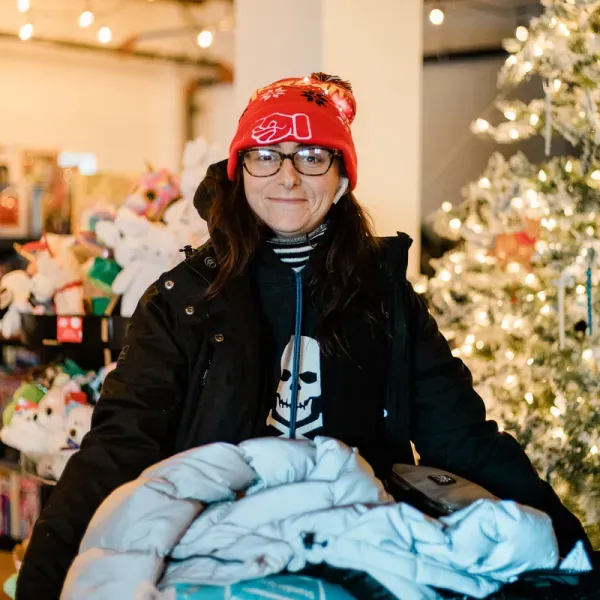 Community member shopping at the Christmas Hamper Store