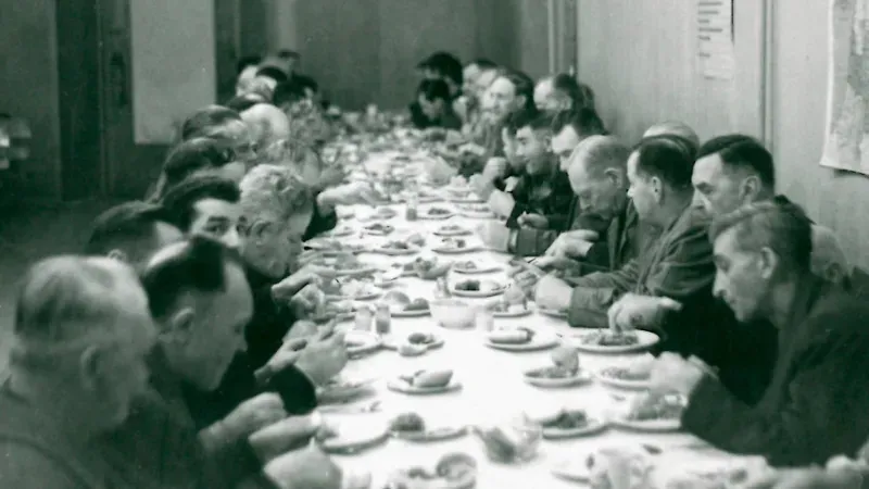 Historic photo of one of UGM's early meals